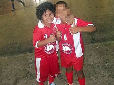 'Tinha tudo para ser campeão', diz técnico de menino morto em tiroteio