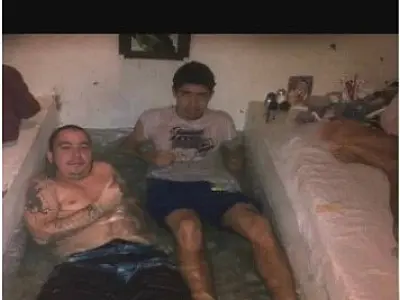 Preso aparece fumando e em piscina improvisada dentro da cadeia